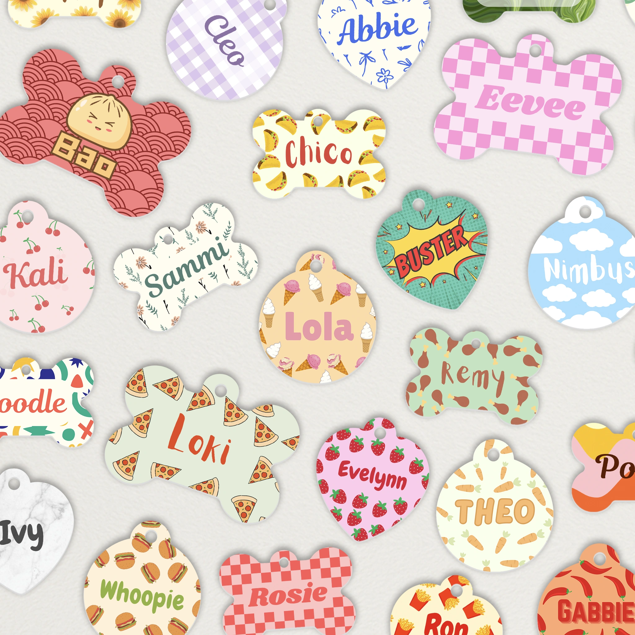 Collection of pet tags laid out on table